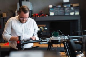 person working with a drone
